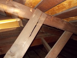 Cracked roof rafter support wood member